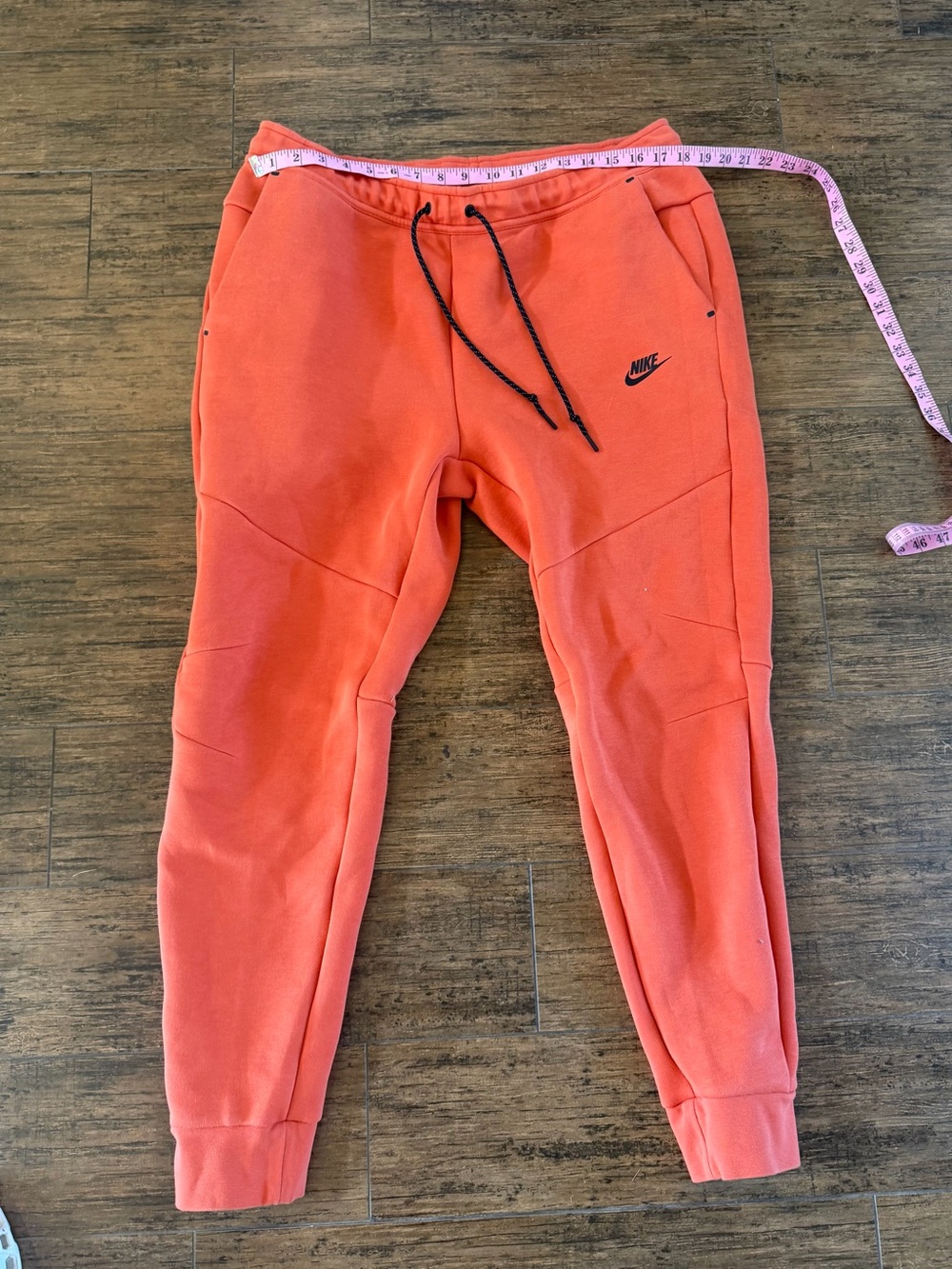 Nike Sportswear Tech Fleece Joggers in a bright lobster red or vibrant coral XL